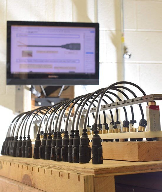 Cable assemblies connected to a test fixture at DEM